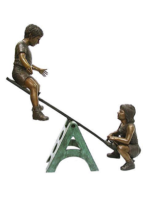 Bronze Children Playing on Seesaw Bronze Children Playing on Seesaw