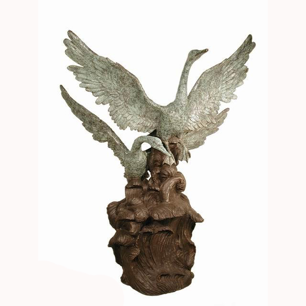 Bronze Swans on a Wave Bronze Swans on a Wave