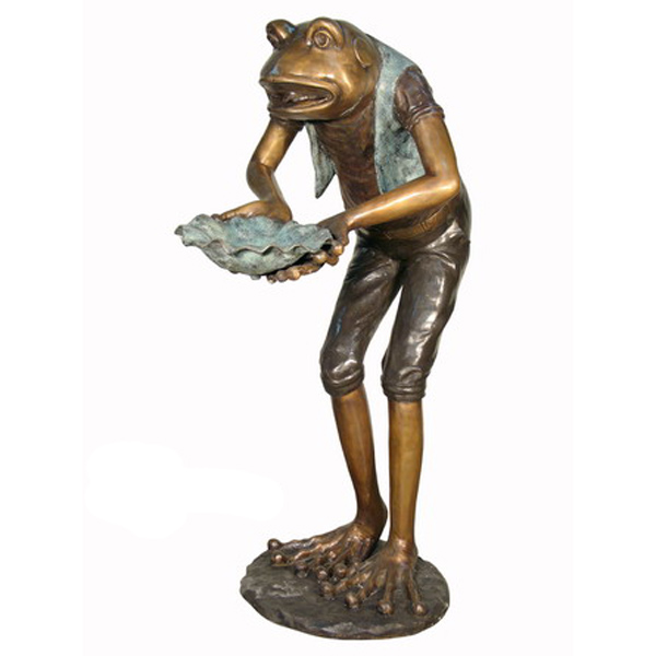 Bronze Frog holding Shell Bronze Frog holding Shell