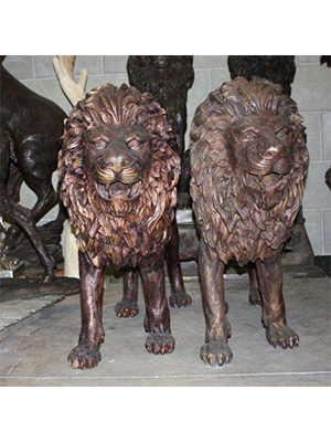 Pair of Bronze Walking Lions Pair of Bronze Walking Lions